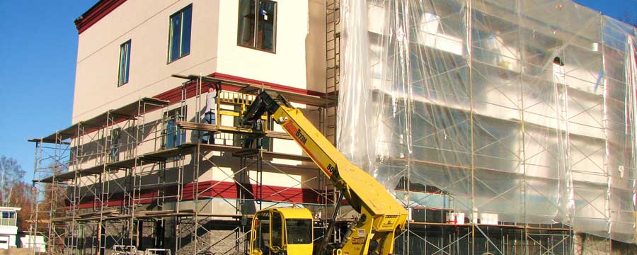 Construction site exterior with a forklift